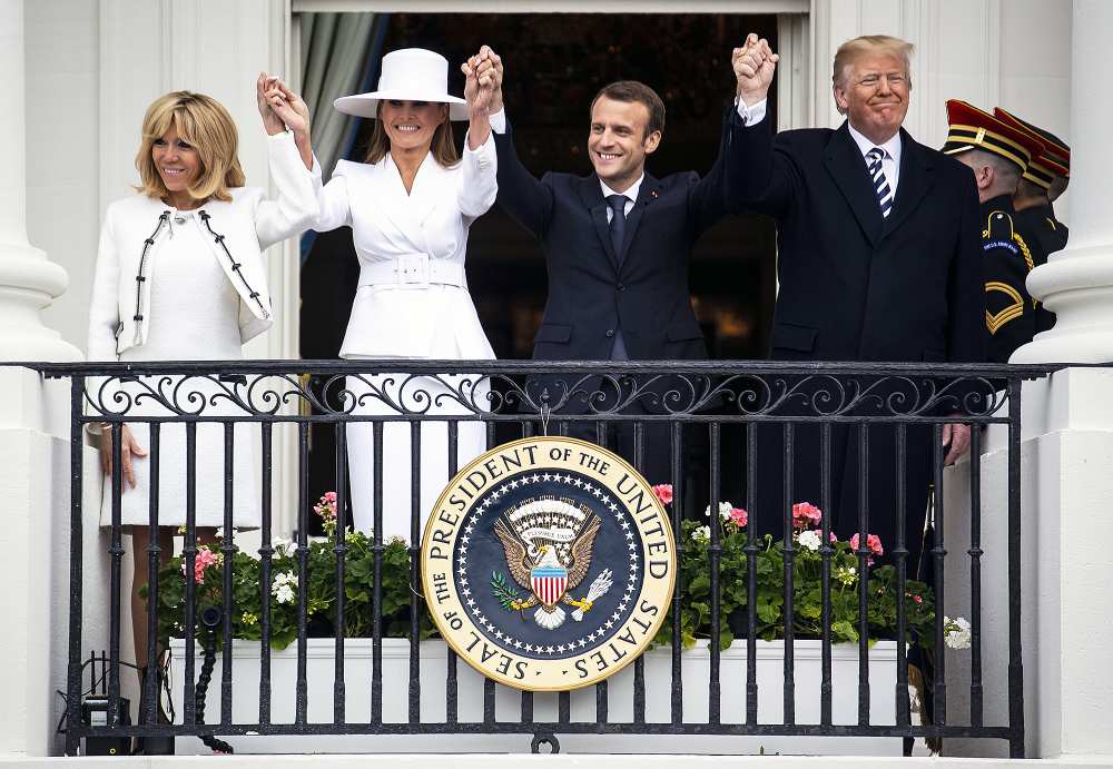 Brigitte Macron Melania Trump Emmanuel Macron Donald Trump holding hands