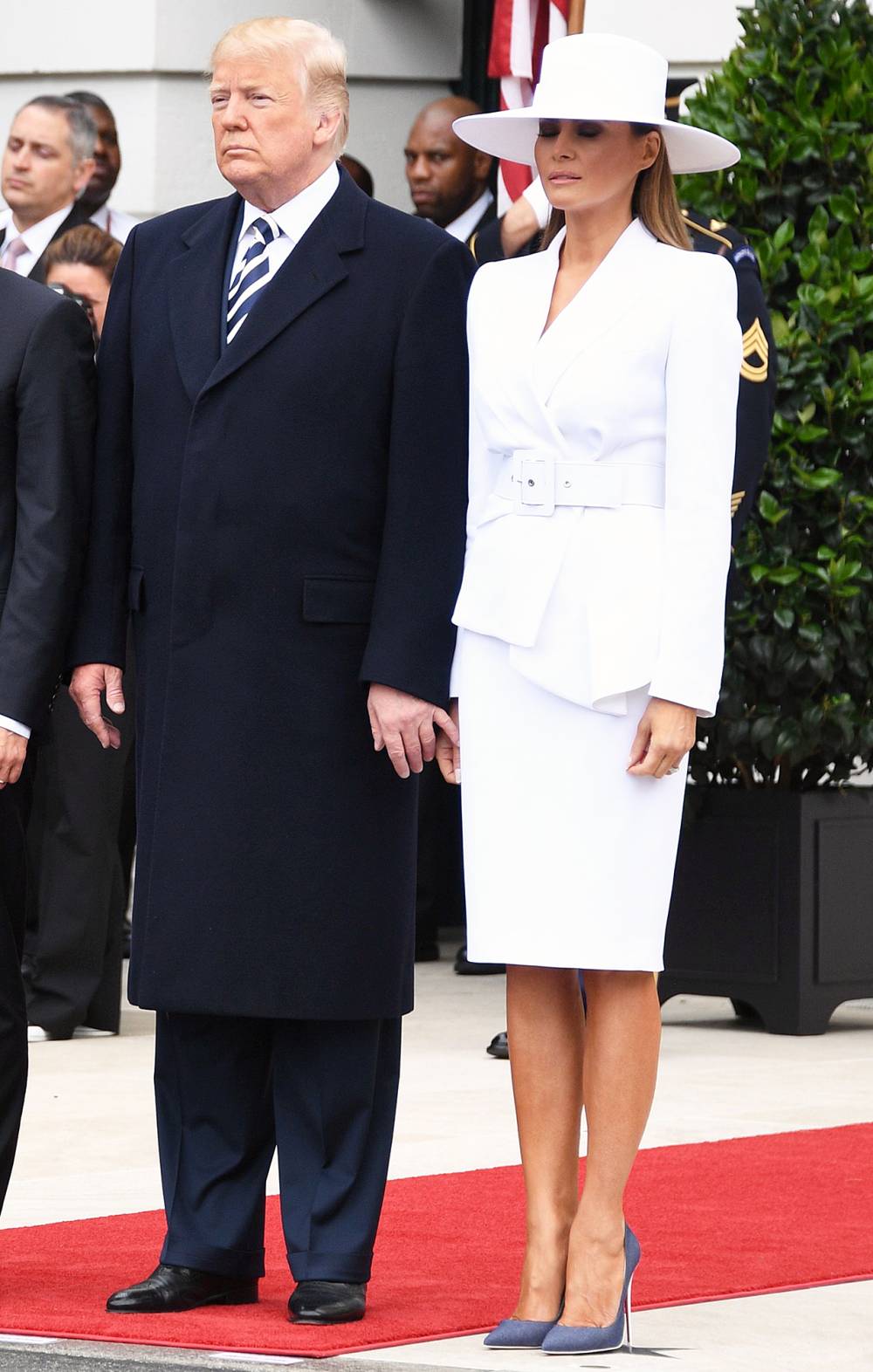 Donald Trump Melania Trump awkward holding hands