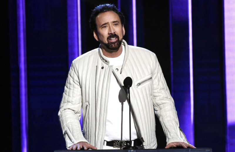 Nicolas Cage Packs on PDA With Mystery Woman at Independent Spirit Awards