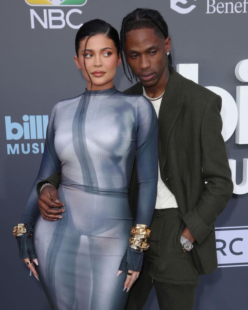 Kylie Jenner and Travis Scott's Pals Expect Them to Get Back Together Despite Split: They 'Have the Same Issues' grey blue gown