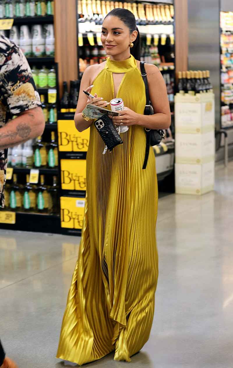 Vanessa Hudgens self promotes her Cali Water at Pavillion grocery in a gold gown