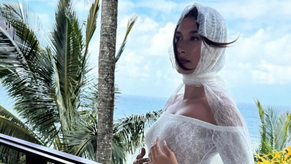 Pregnant Hailey Bieber Cradles Baby Bump in New Photo From Stunning Maternity Shoot