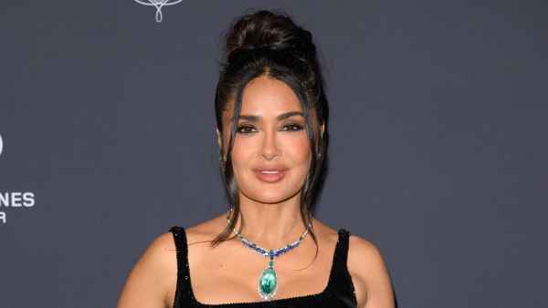 Salma Hayek Playfully Unties Her Bikini Bottoms While Dancing on a Balcony