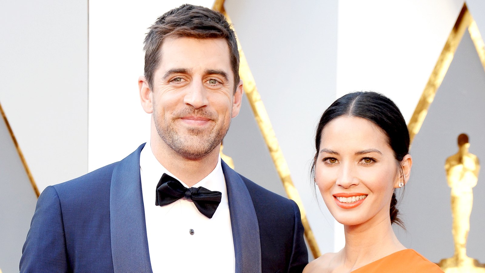 Olivia Munn and Aaron Rodgers attend the 88th Annual Academy Awards at Hollywood & Highland Center in Hollywood on February 28, 2016.