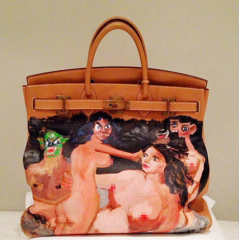Kim Kardashian covers her face with a Birkin bag in LA
