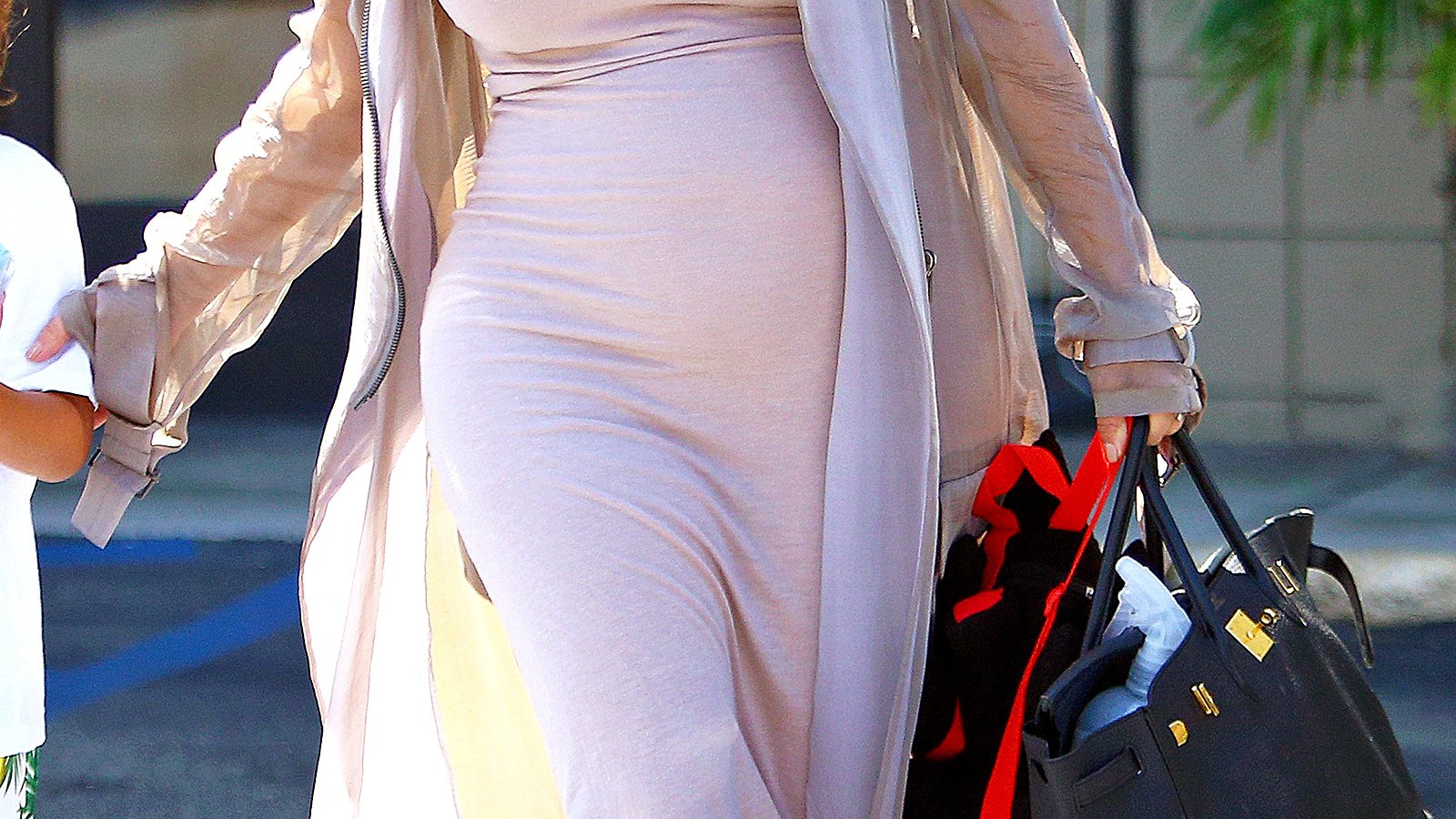 Kim Kardashian Not Breaking the Internet Shows Off an Hermes Bag By North  West