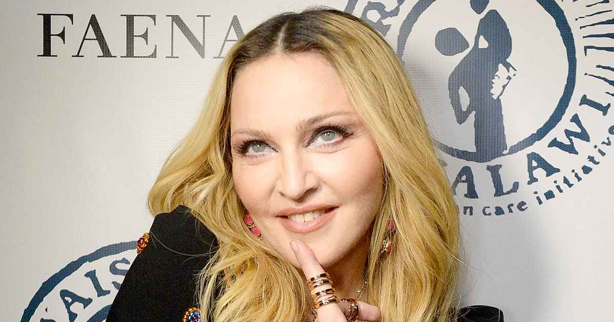 Madonna Uploaded a Super-Relatable Instagram of Herself Posing Topless with  a Louis Vuitton Handbag