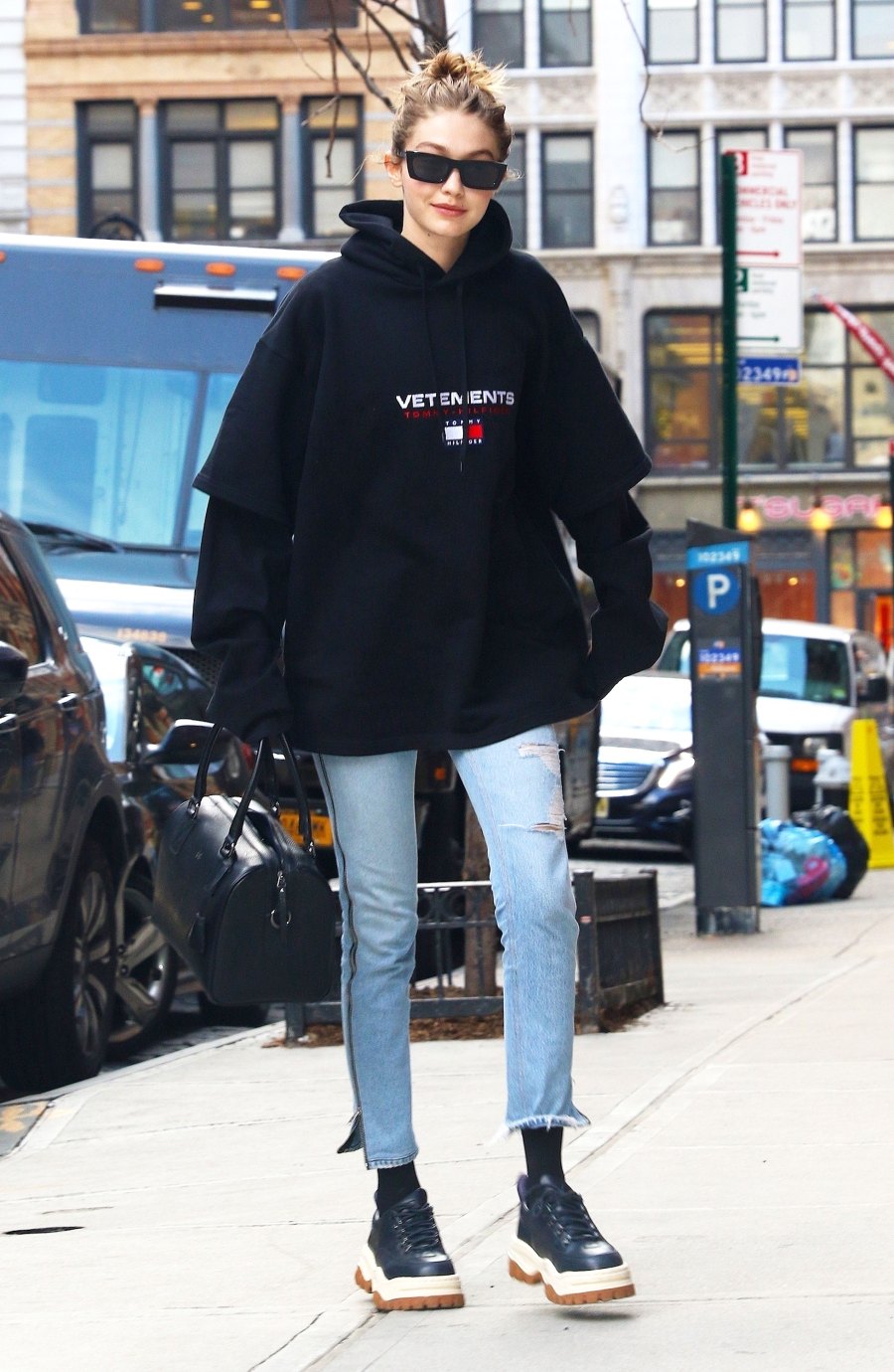 Gigi Hadid Wears Oversize Vetements Sweatshirt in NYC