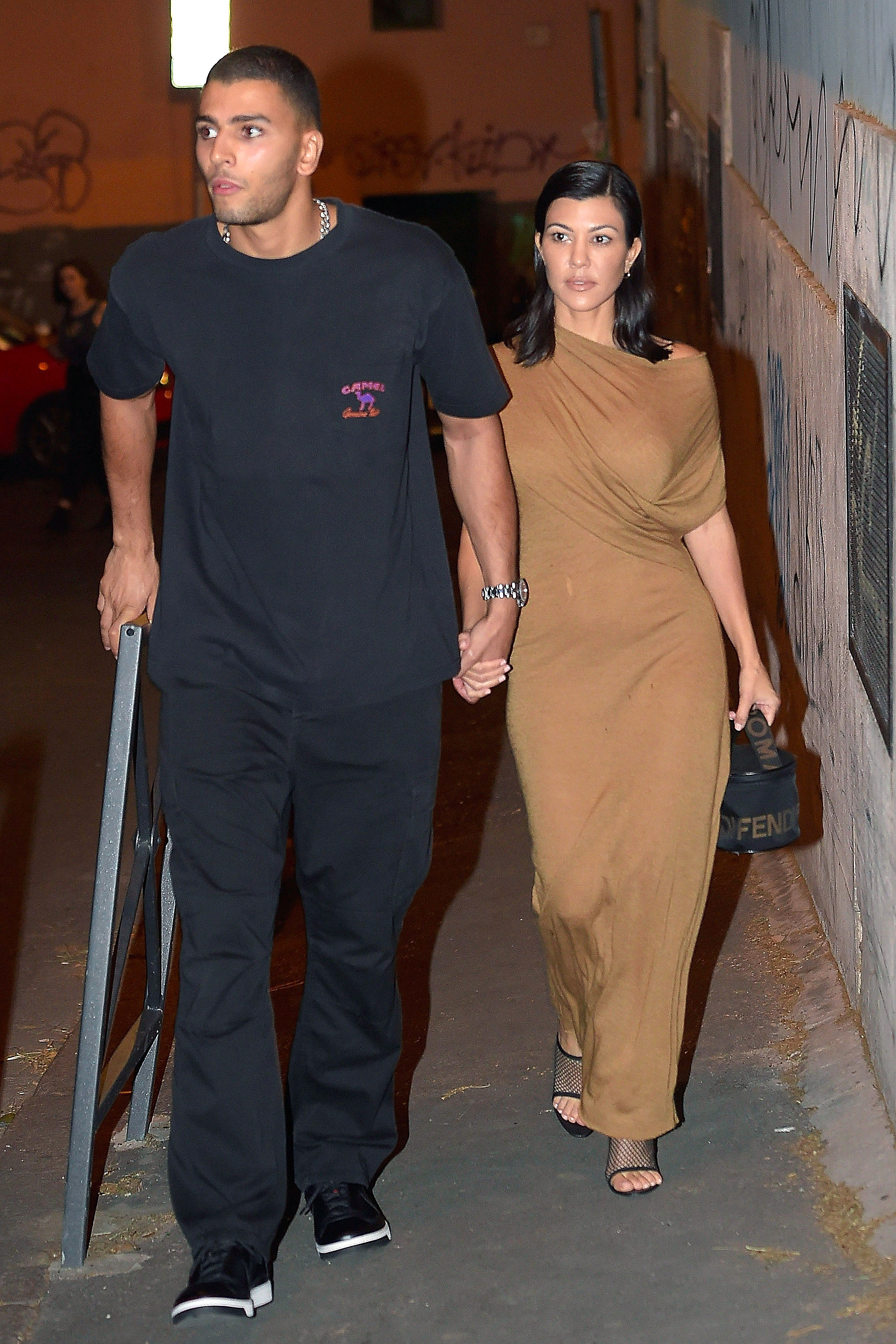 Kourtney Kardashian Wears Demure Maxidress in Rome Details picture photo