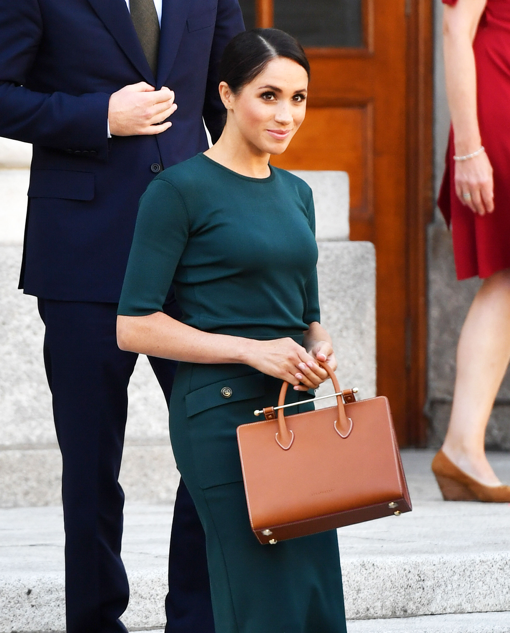 Strathberry 'thrilled' after Meghan Markle carries one of their bags on  first royal engagement - Business Insider