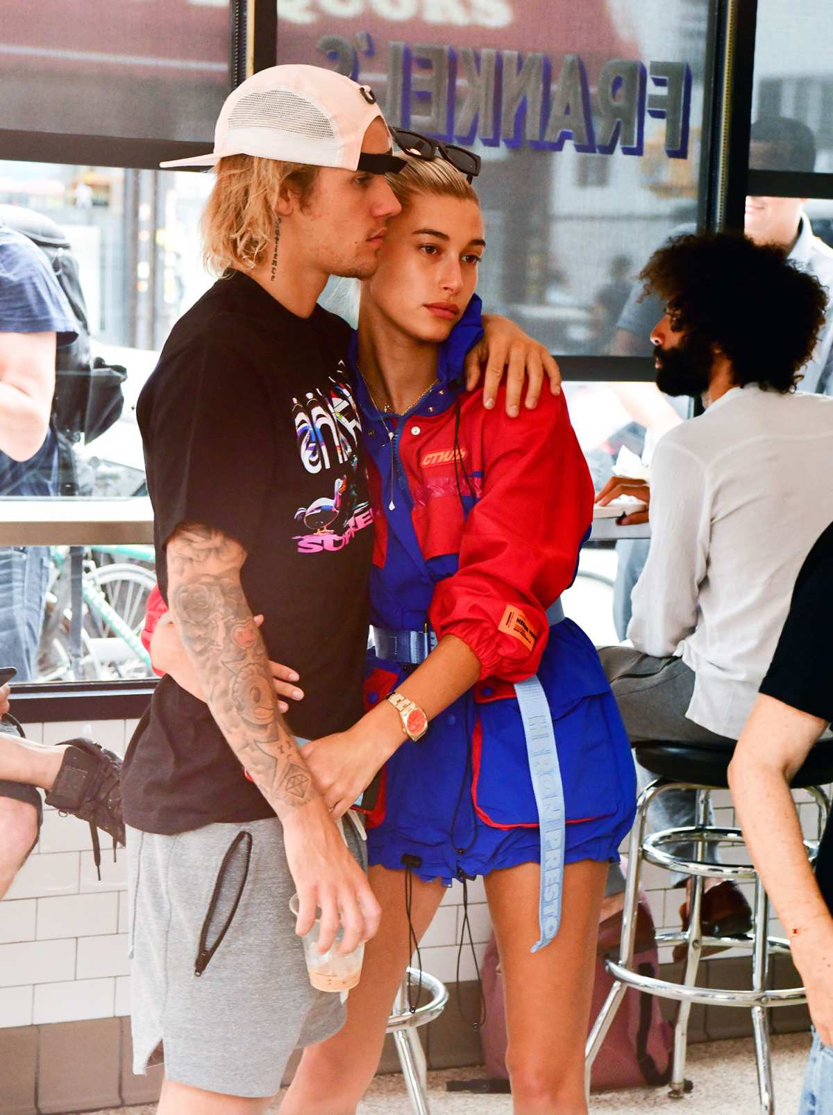 hailey baldwin and justin bieber are all smiles while justin shows off his  louis vuitton slippers as the couple stepped out in new york city-150219_5