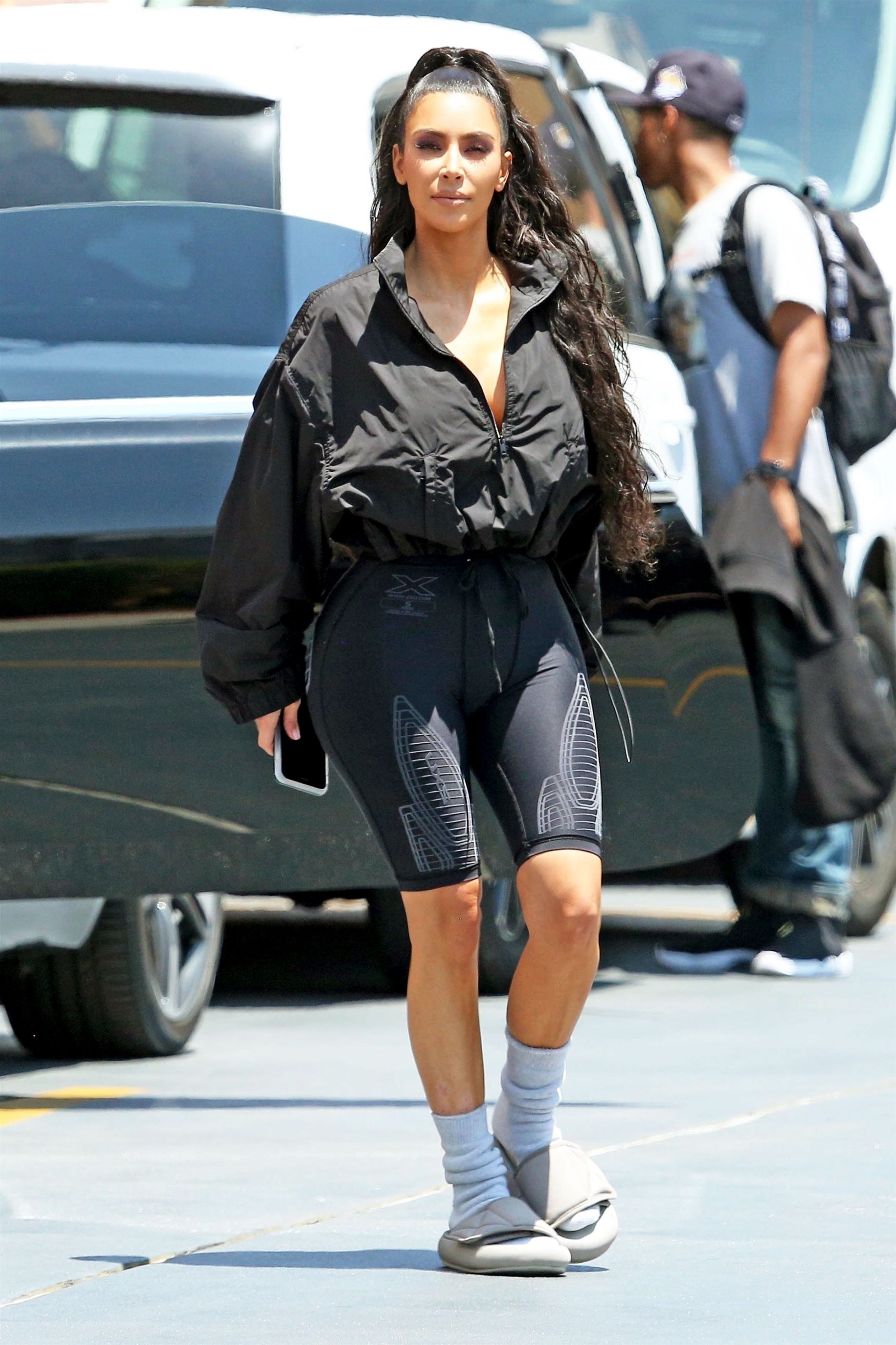 Kim Kardashian Wears Yeezy Slides With Socks Details Usweekly