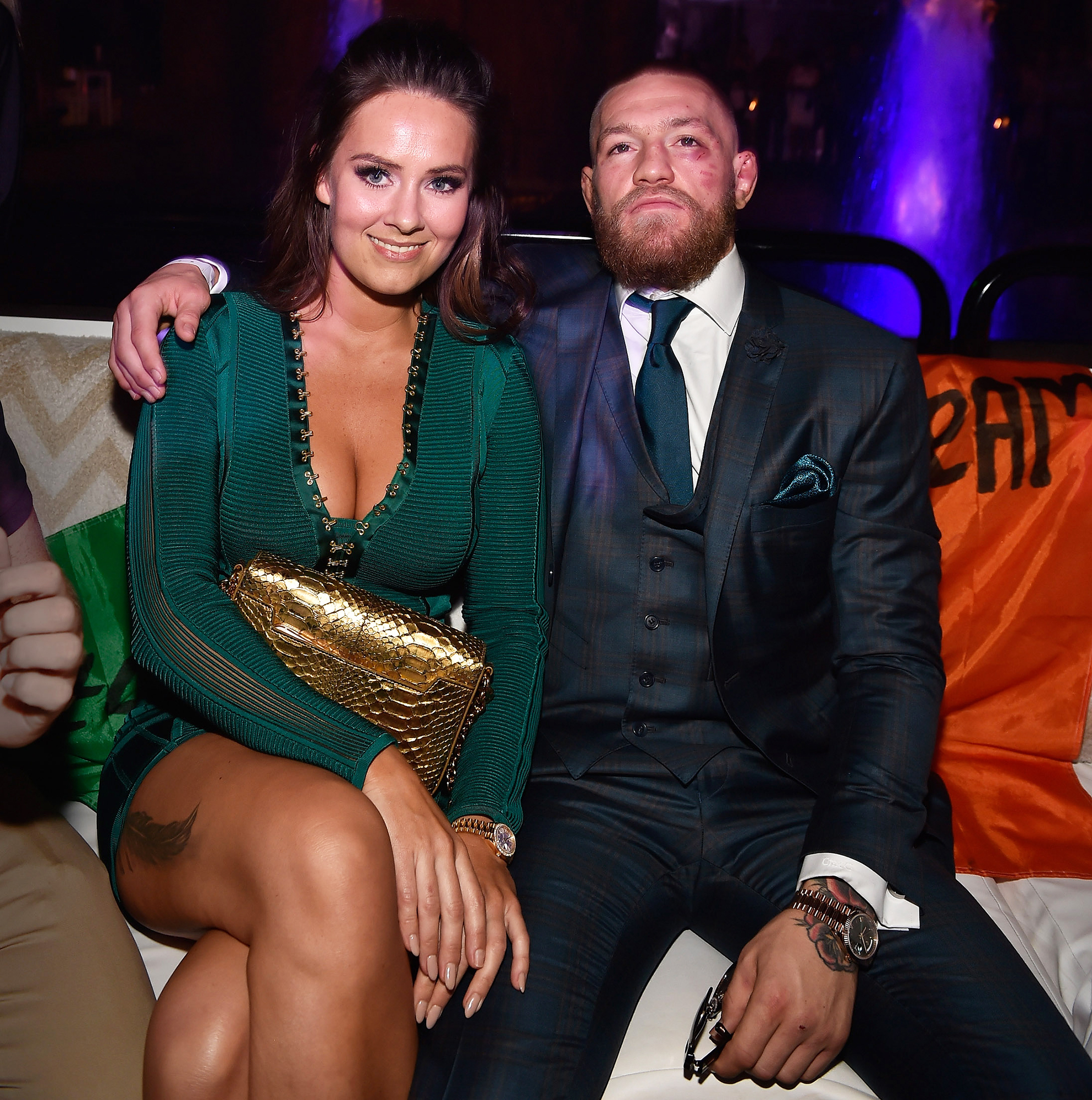 UFC champion Conor McGregor poses with long-term girlfriend Dee as he  returns home