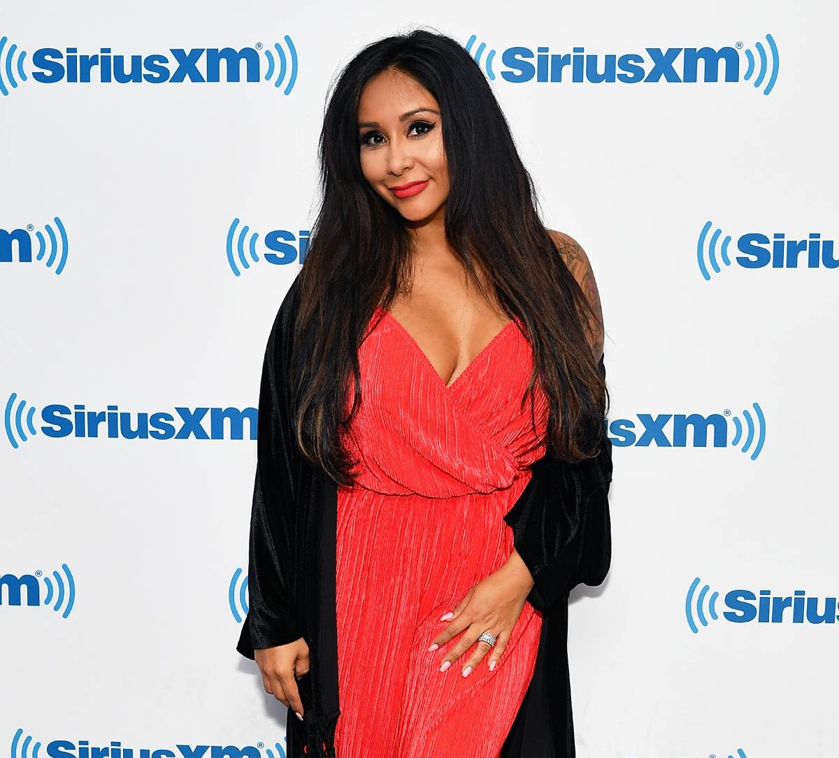 Tattle: Nicole 'Snooki' Polizzi and fiance Jionni LaValle have a son