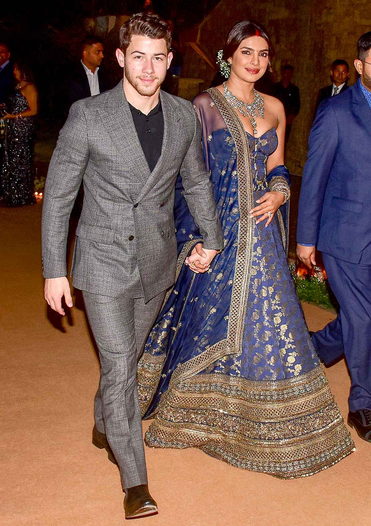 See Nick Jonas and Priyanka Chopra's Wedding Reception Looks – Footwear News