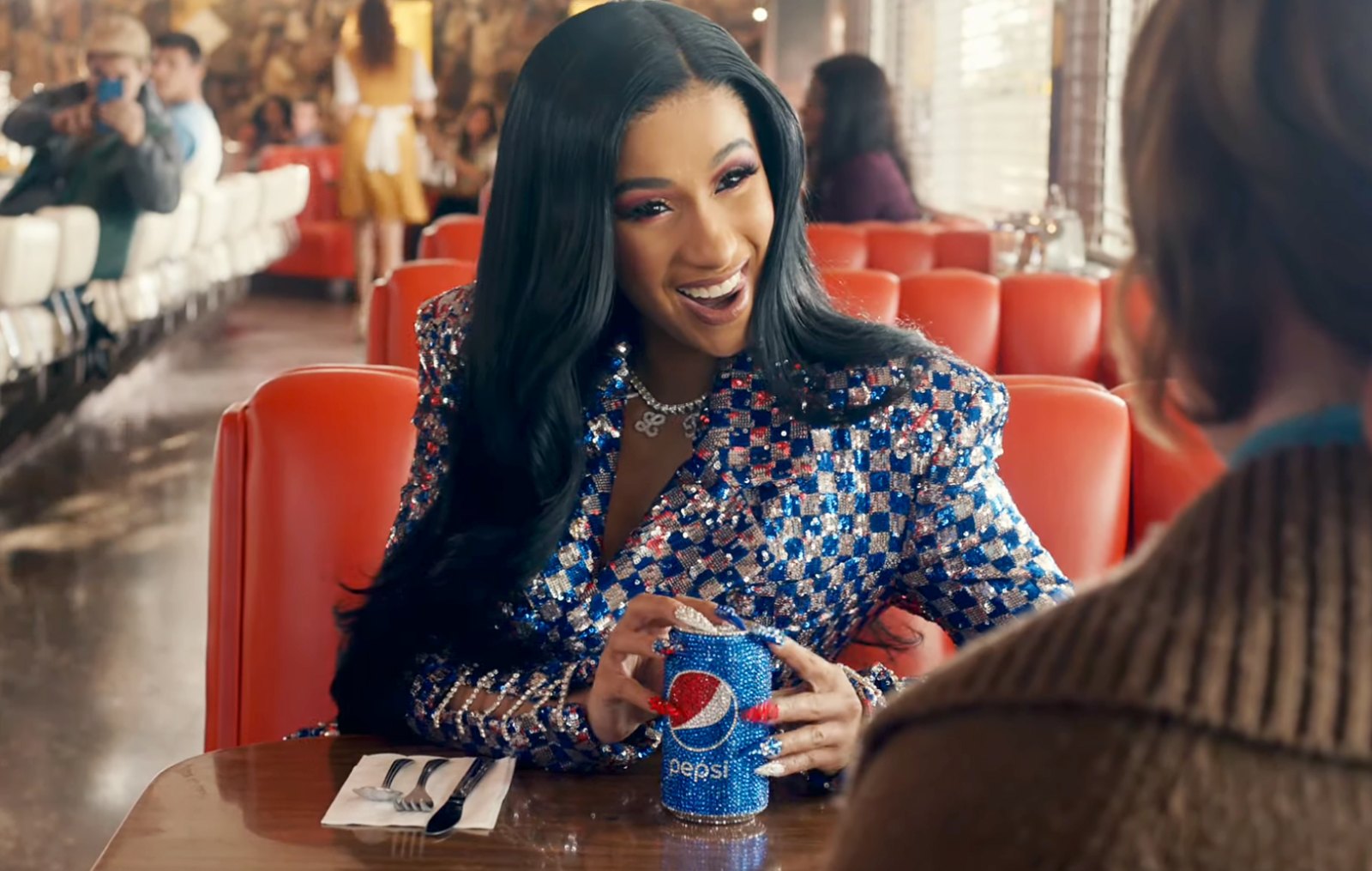 Cardi B Makes Her Signature Sound in Pepsi Super Bowl Ad Watch