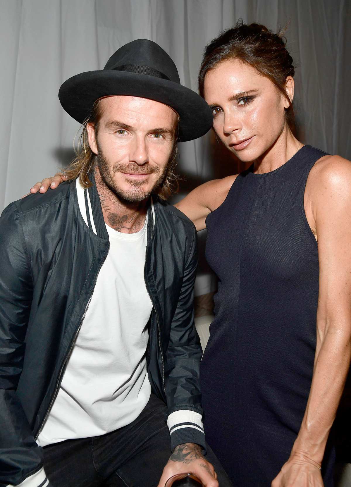 David Beckham and Victoria Beckham look glum on casual date night