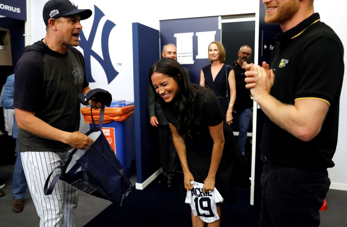 Meghan Harry London Series Inside Red Sox Locker Room Holding Gifts for  Archie June 29 2019 Black Stella McCartney Dress via BRS