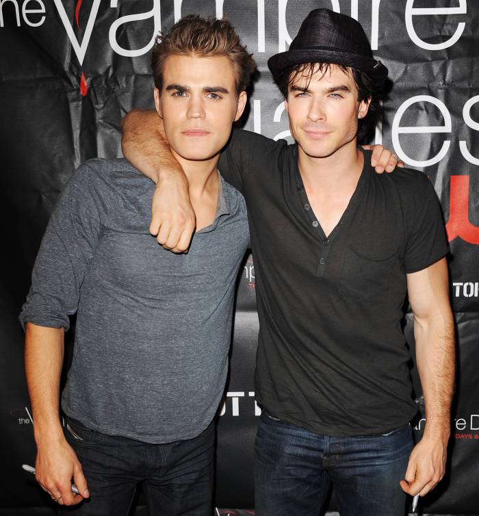 Paul Wesley and Ian Somerhalder pose at a meet and greet for fans at Vampir...