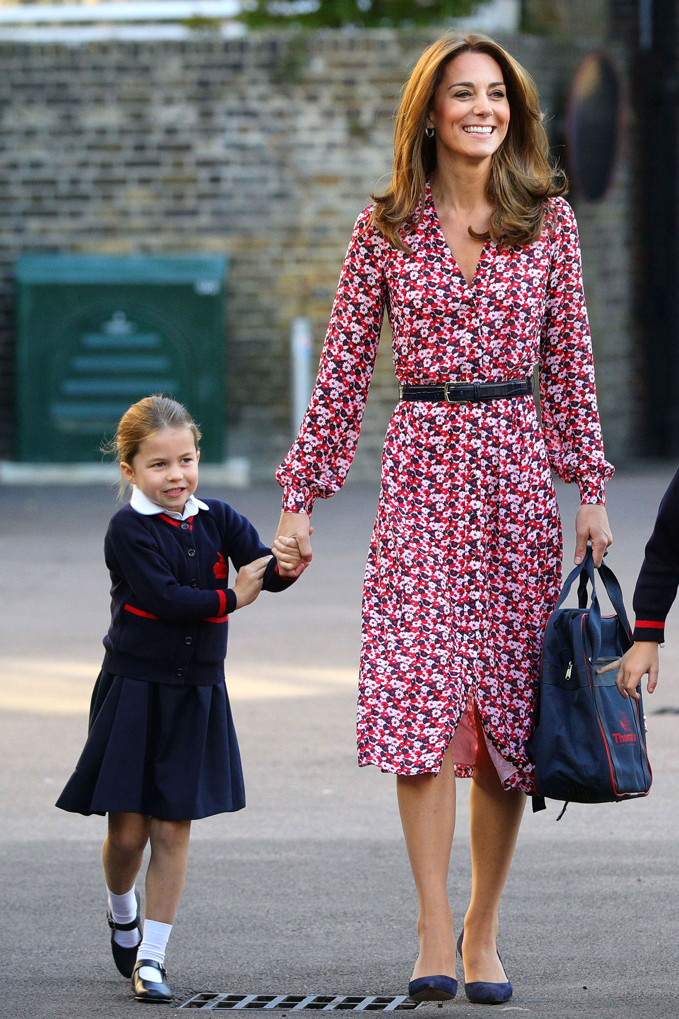 Kate Middleton rewears Michael Kors dress  symbolic bee earrings in  Manchester today  Expresscouk