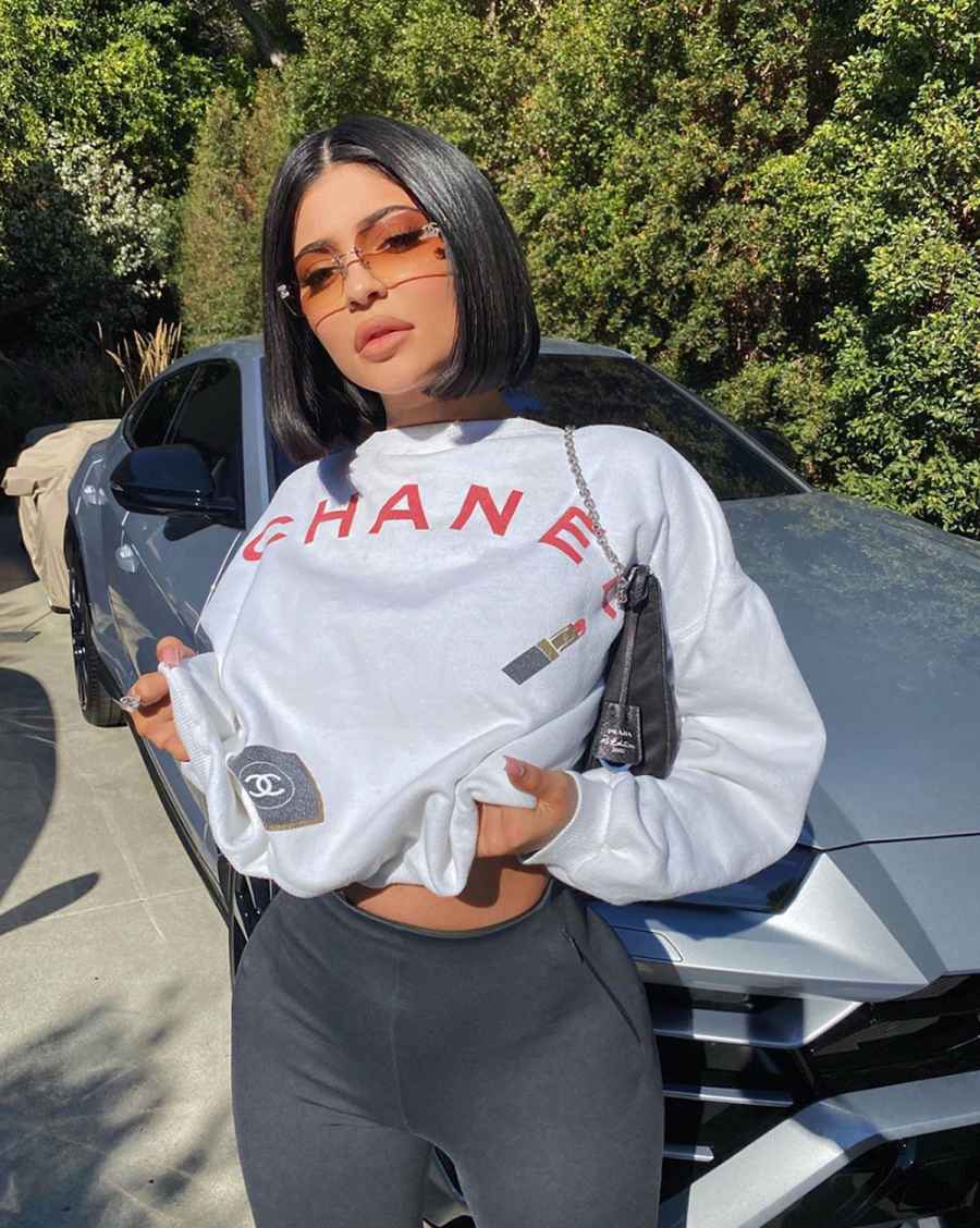 Kylie Jenner in grey sweatpants and white crop top on October 7