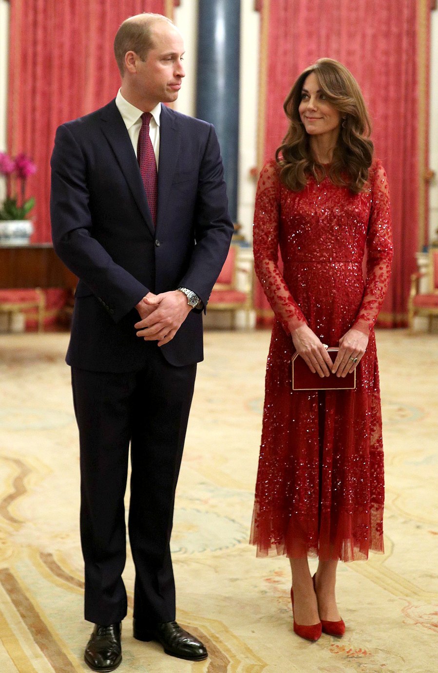 Prince William, Duchess Kate Smile at Buckingham Palace Event