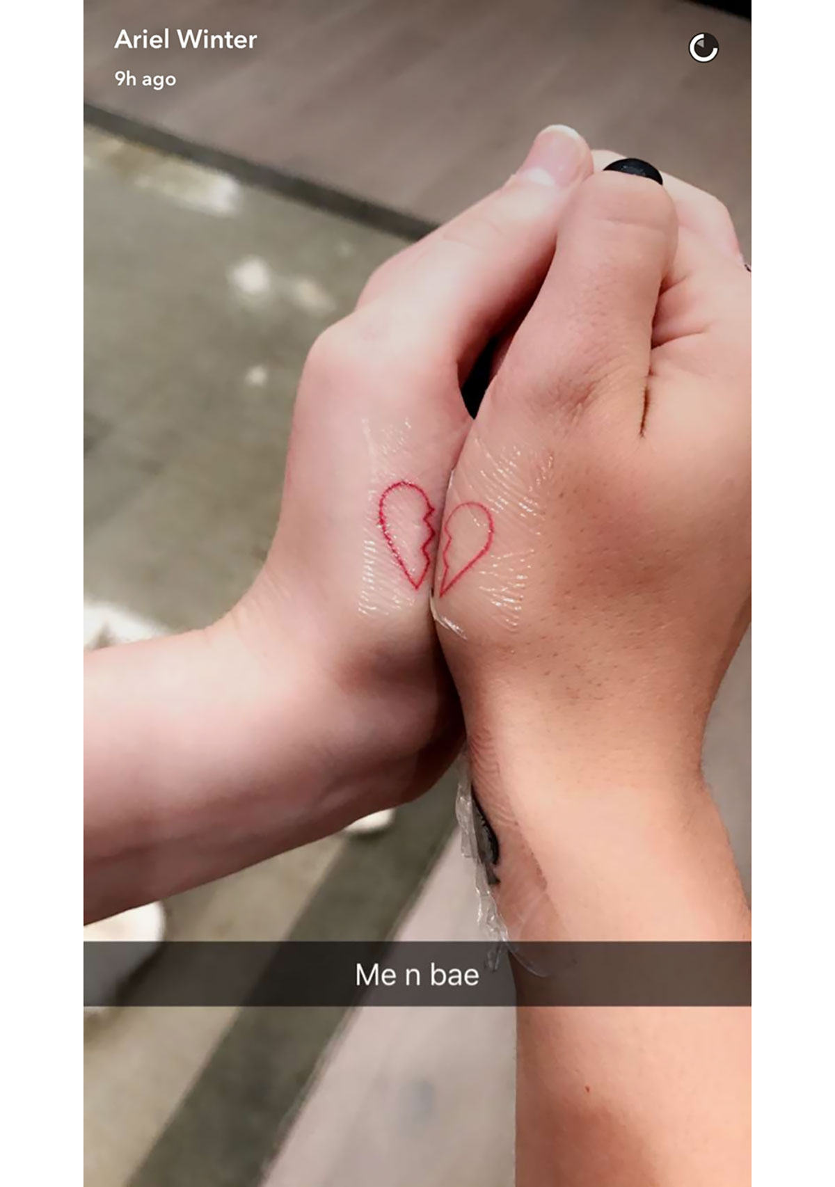 Matching ring tattoo for couple, minimalistic style.