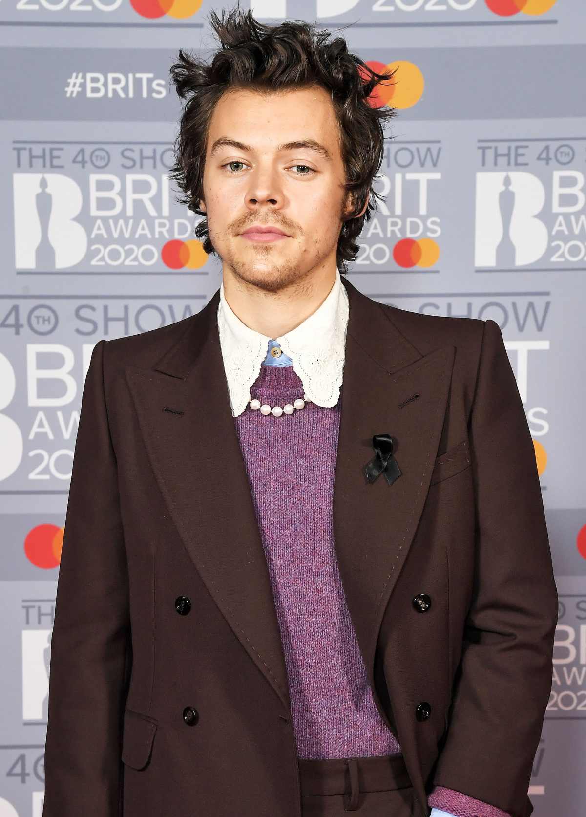 Harry Styles Shares the Story Behind His Green Bay Packers Tattoo | Us ...