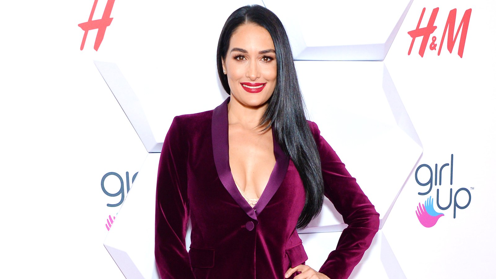 Nikki Bella Shows Off Bare Baby Bump While Dancing in WWE Costume