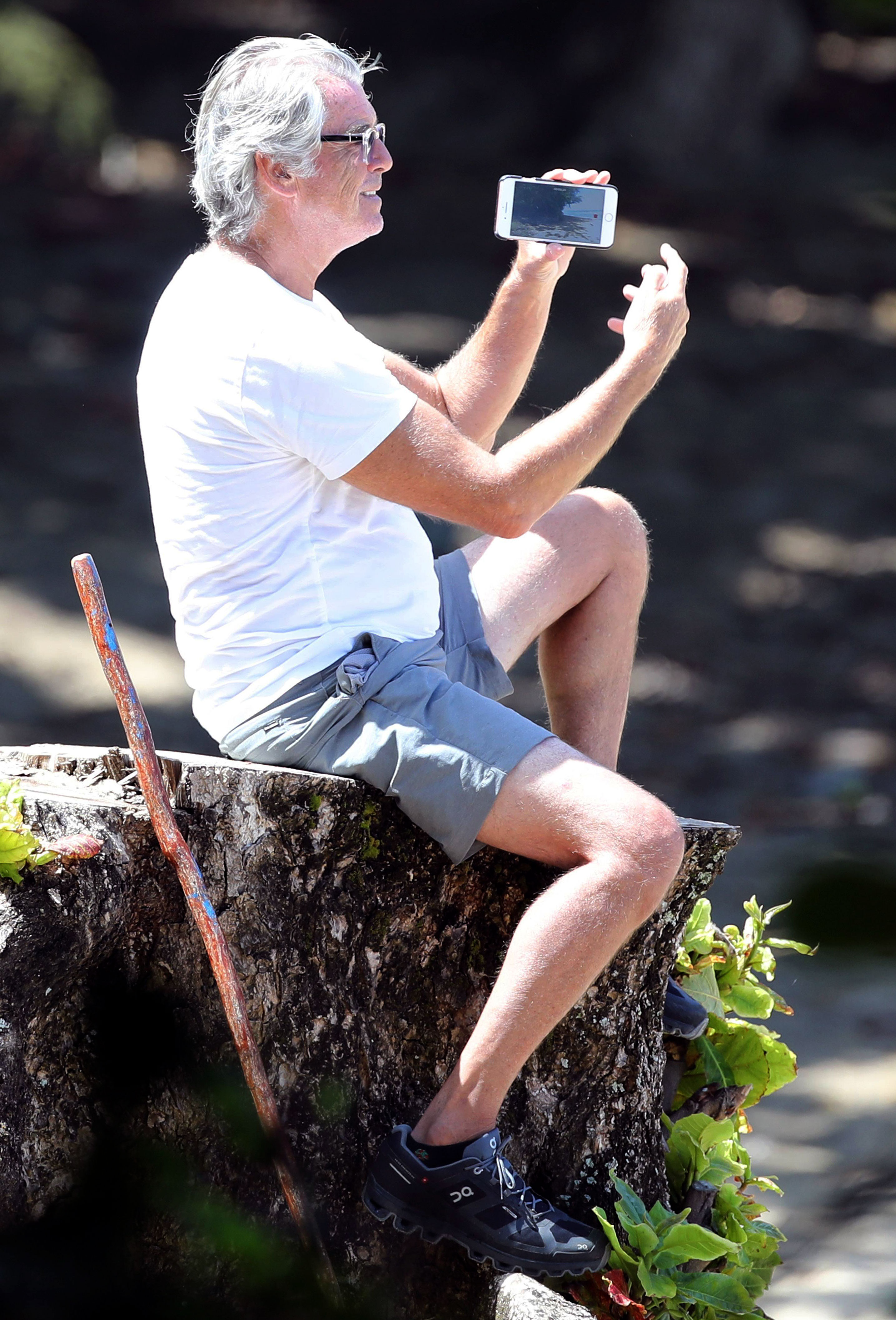 James Bond star Pierce Brosnan, 66, shows off his silver locks during  lockdown stroll in Hawaii – The US Sun