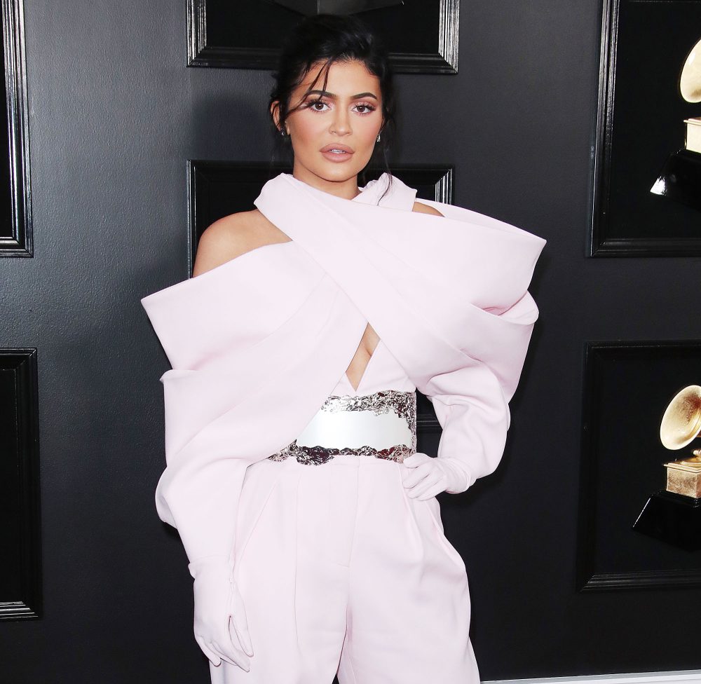Kylie Jenner: White Jumpsuit, Fur Scarf