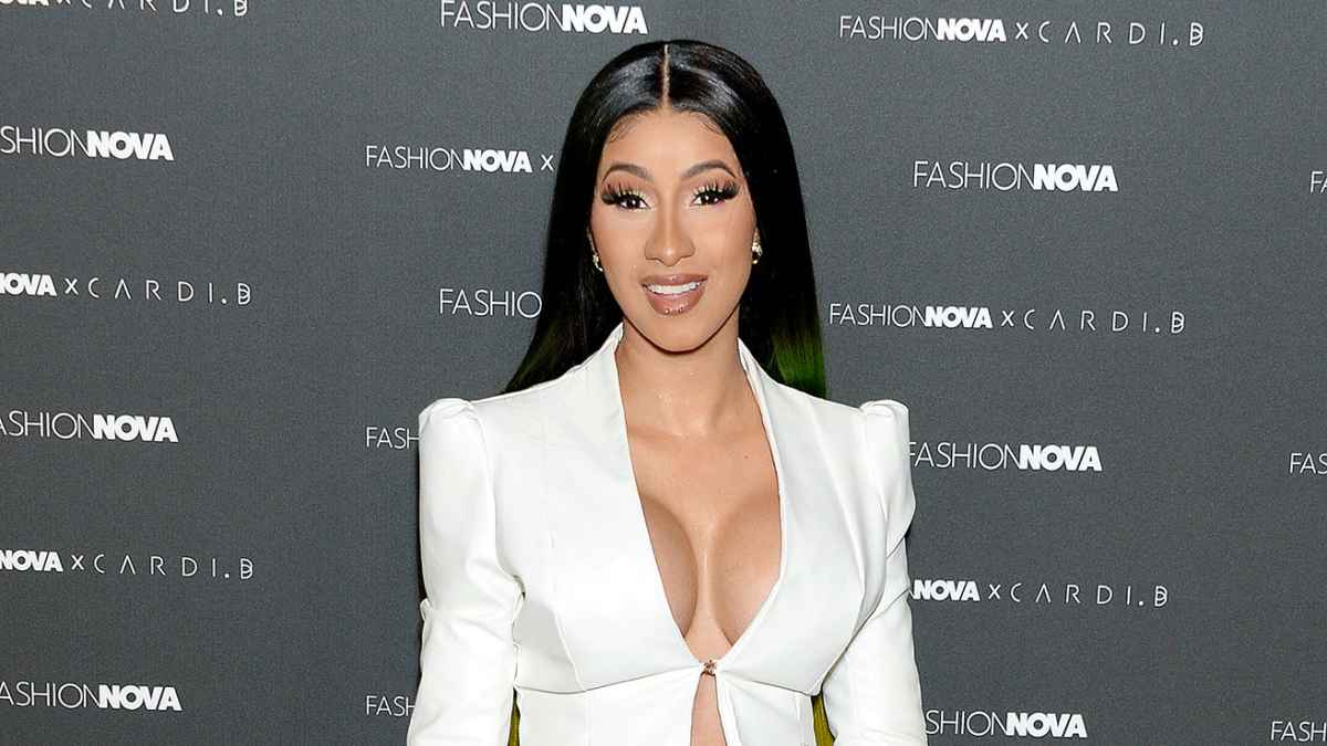 Cardi B continues to clap back at 'haters' claiming she edited her 'spicy'  photo showing off tattoo
