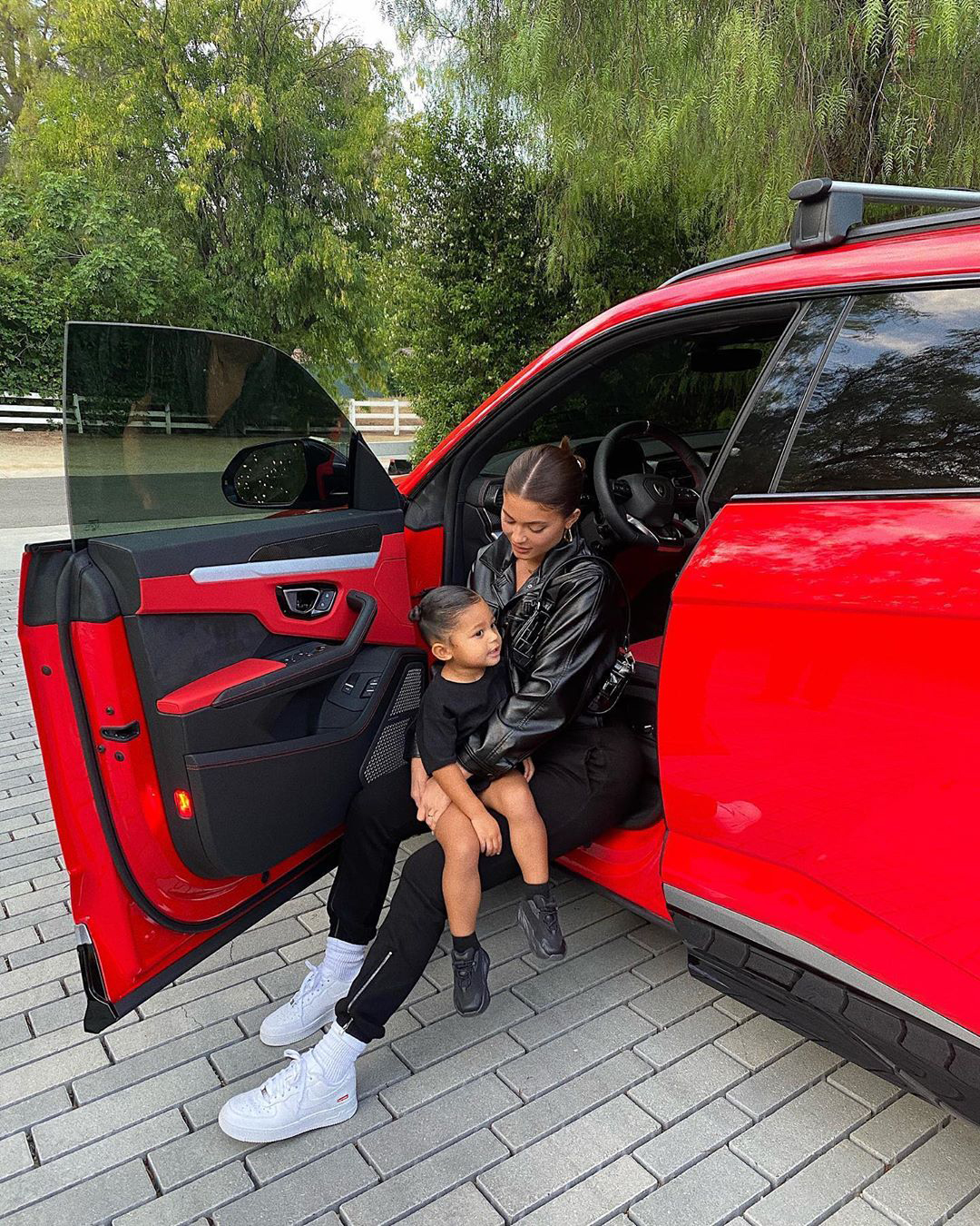 Kylie Jenner shares sweet pic of Stormi posing in front of her custom Louis  Vuitton toy car