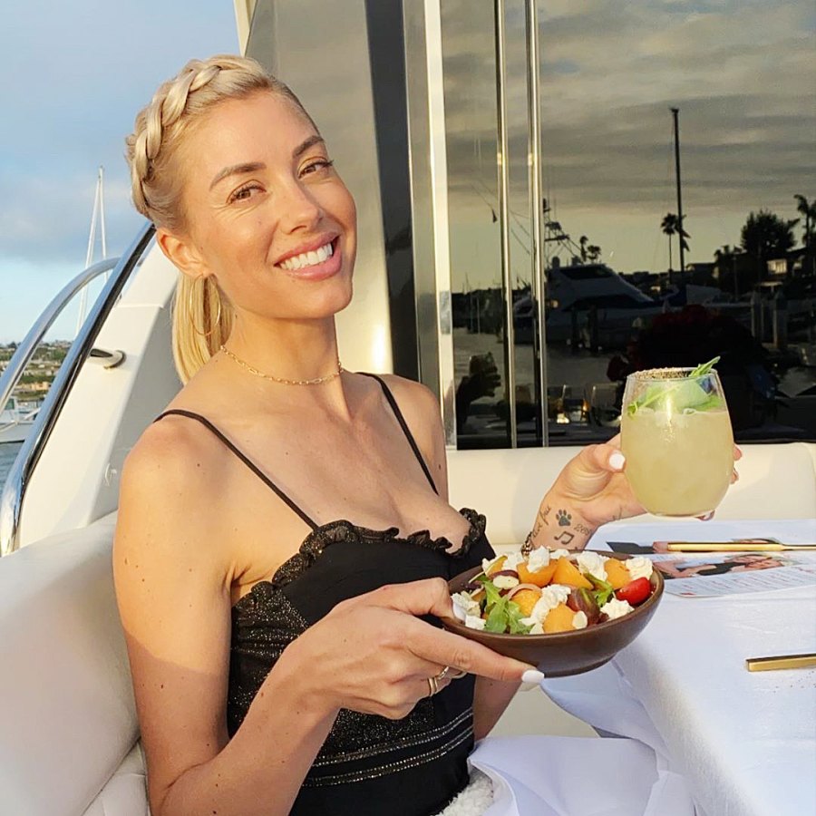 Heather Rae Young with a salad and cocktail Stars Show Off Their Summer Eats