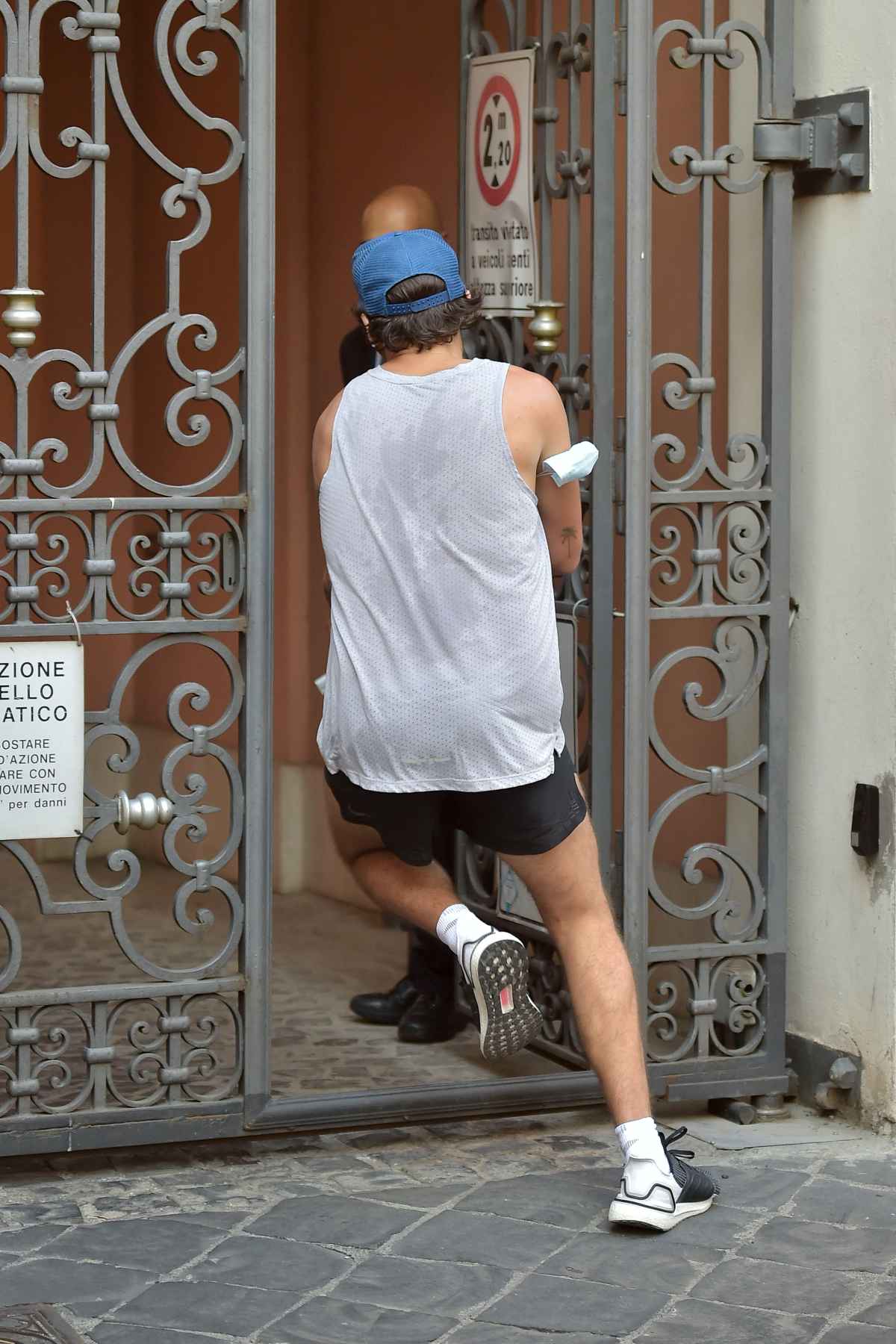 Harry Styles Running in Italy With New Mustache: See Photos