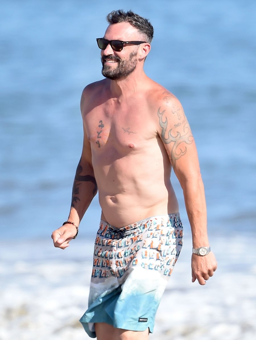 Brian Austin Green Hits the Beach With Tina Louise: Photos