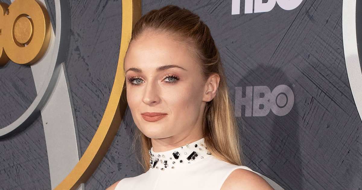 Sophie Turner gazes lovingly at her three-month-old baby girl Willa on a  morning walk