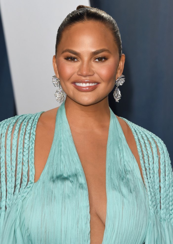 Chrissy Teigen Debuts Ooh Laa Spine Tattoo After John Legend S Song