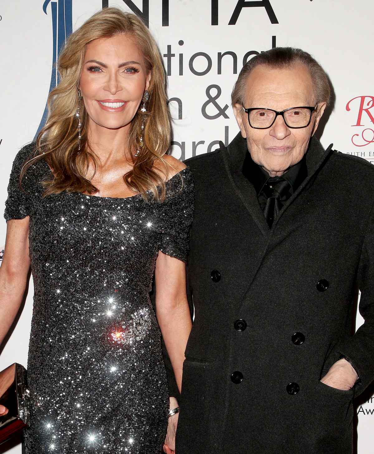 Larry King's estranged wife Shawn says family wore his signature suspenders  to funeral four days after his death at 87