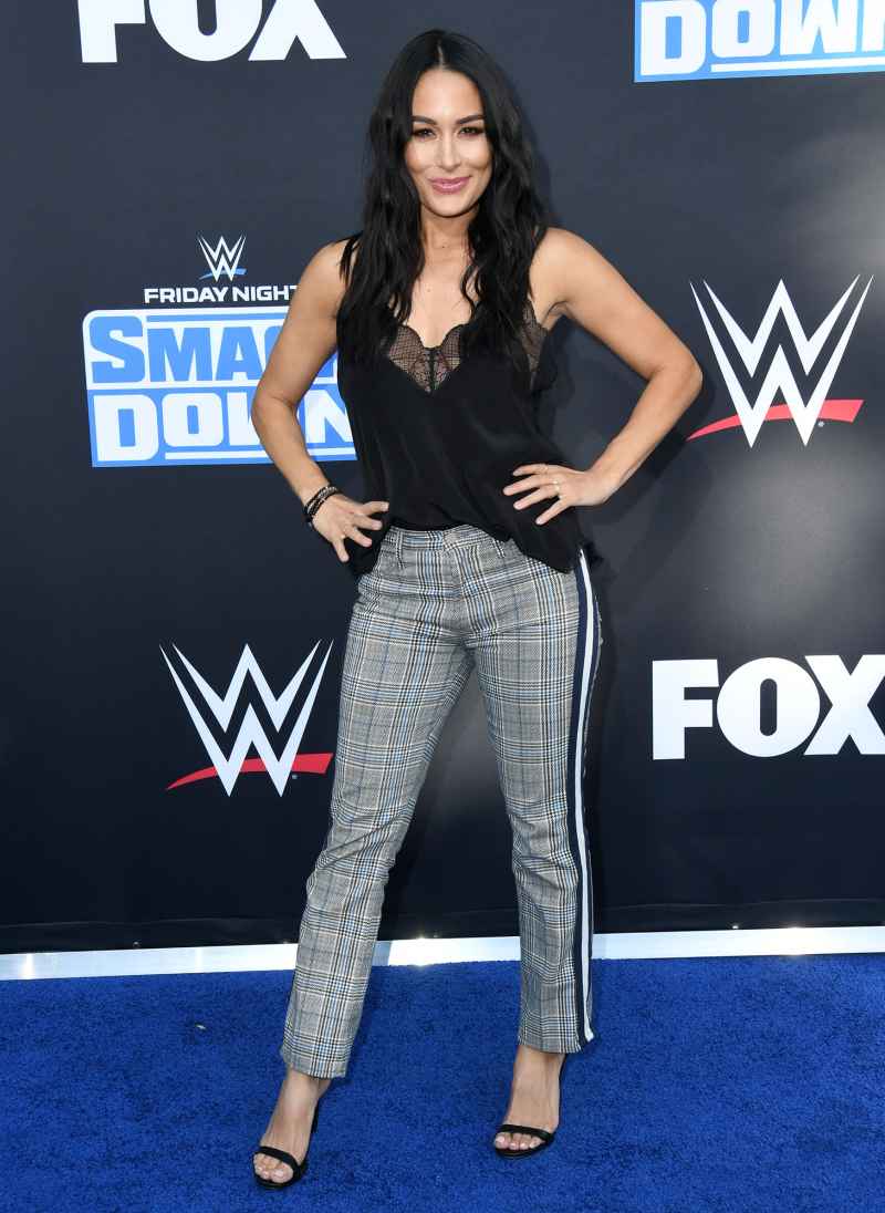 Nikki Bella Gets Sleek in LBD & Pumps With Sister Brie Bella in NYC –  Footwear News