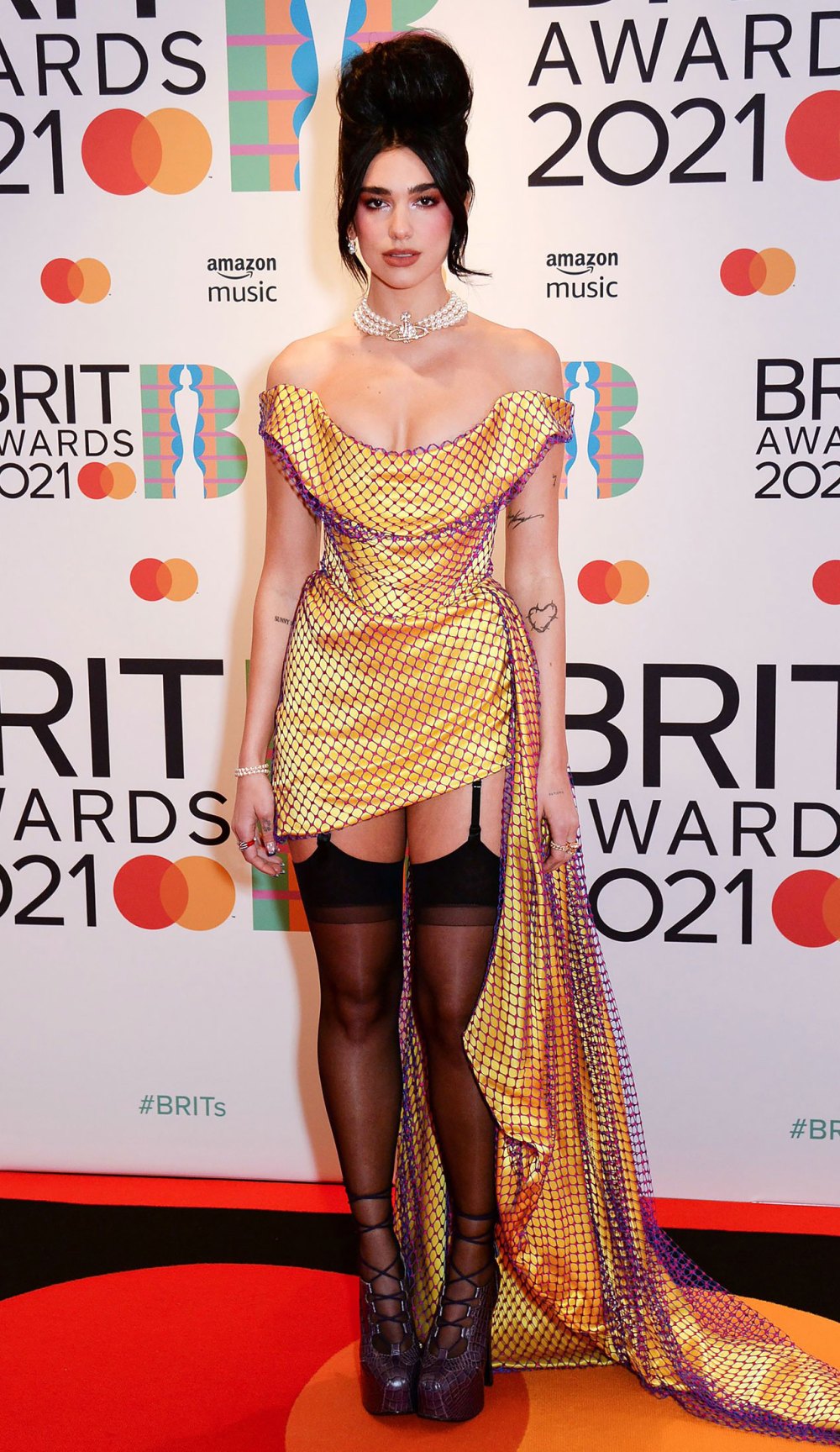 BRIT Awards 2021 Red Carpet Fashion, Dresses, Suits