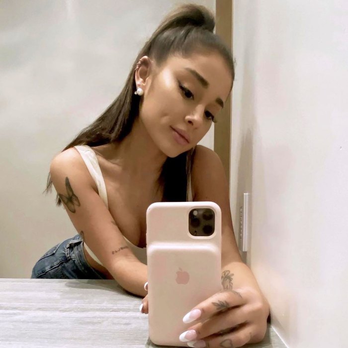700px x 700px - Ariana Grande Covered Up Arm Tattoos for Wedding Photos