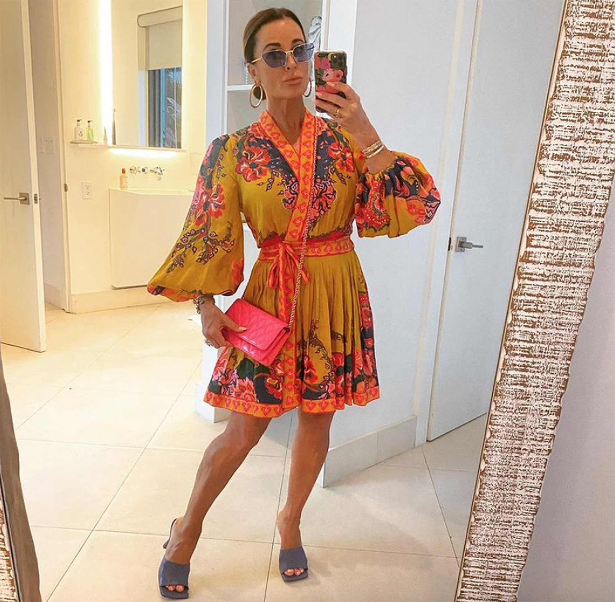 Kyle Richards looks summer-ready with bright yellow bag