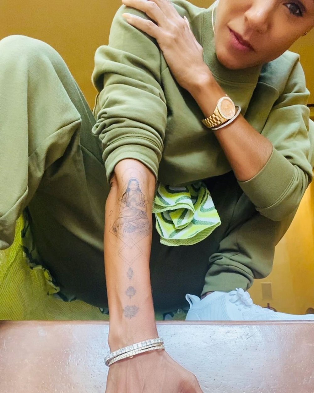 Jada Pinkett Smith Debuts New Arm Tattoo Green Sweatshirt