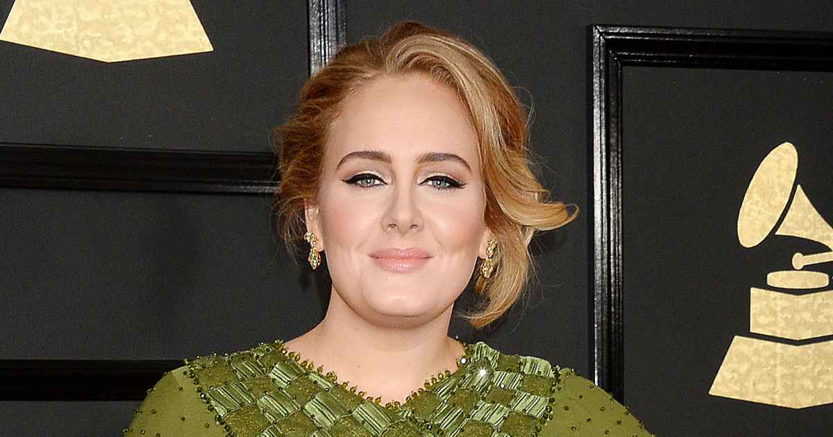 Adele covers Vogue in glamorous corset gown