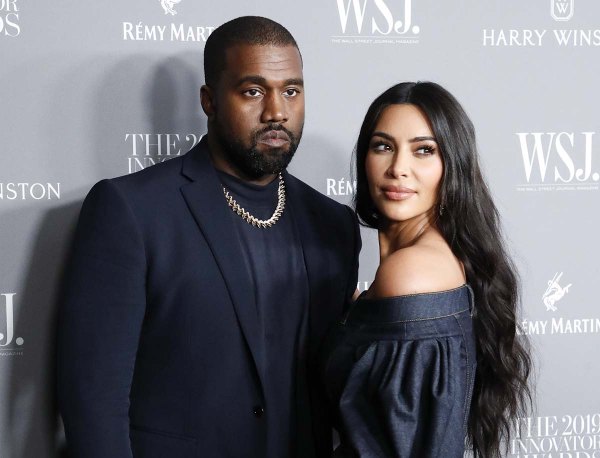 Why Kanye West Bought House Next to Kim Kardashian Amid Divorce | Us Weekly