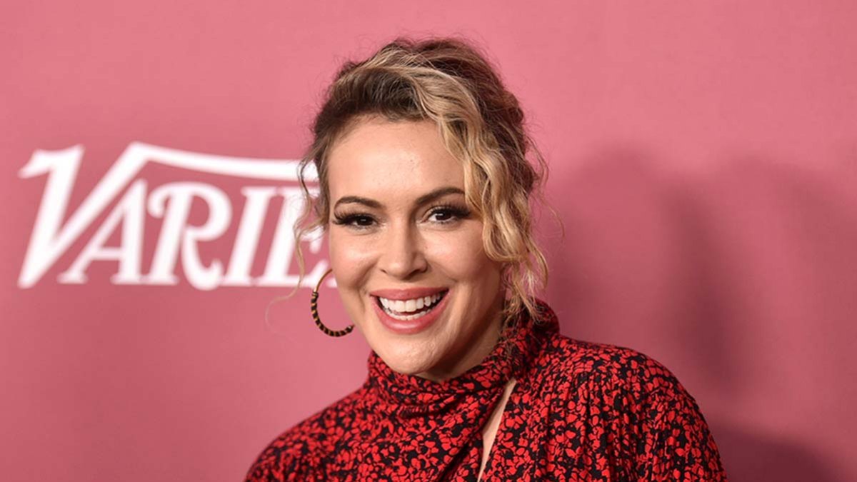 Alyssa Milano Goes Braless in Bold Dress & Shows Just a Little Too