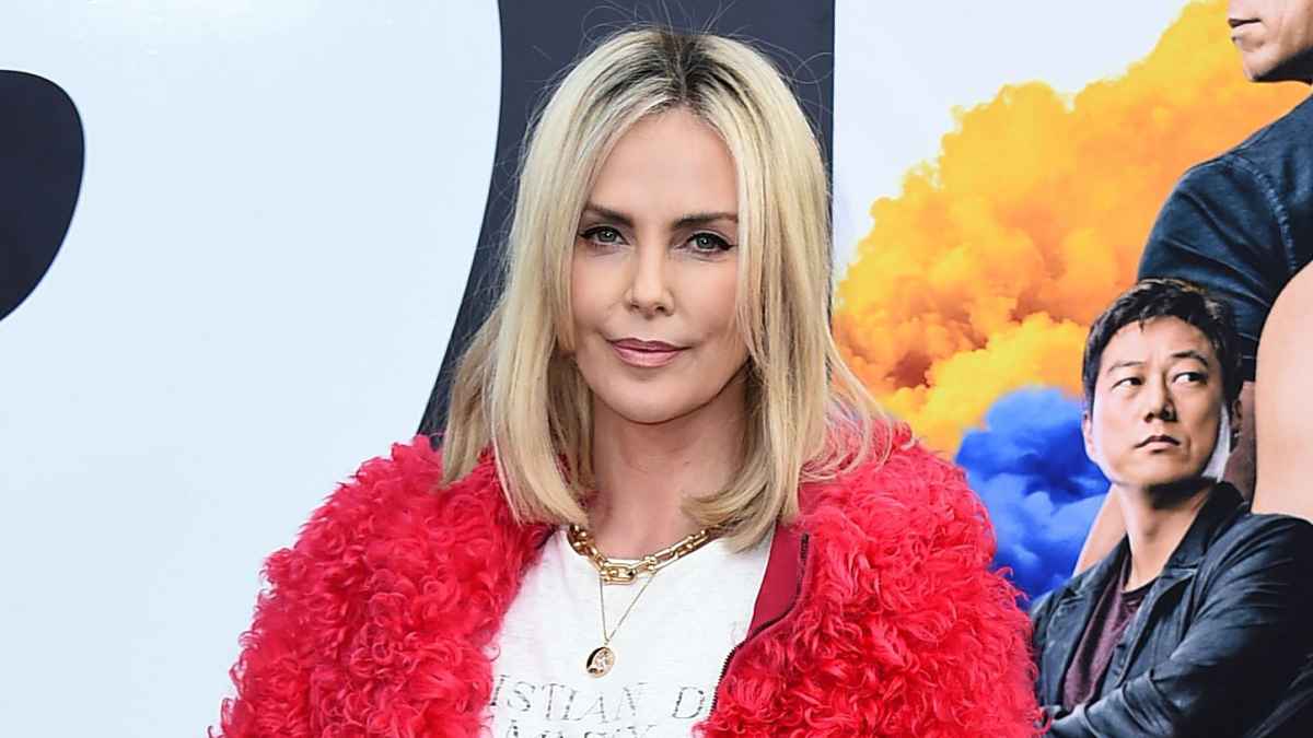 Charlize Theron Reveals The Identity Of Her Super Bowl 'Mystery