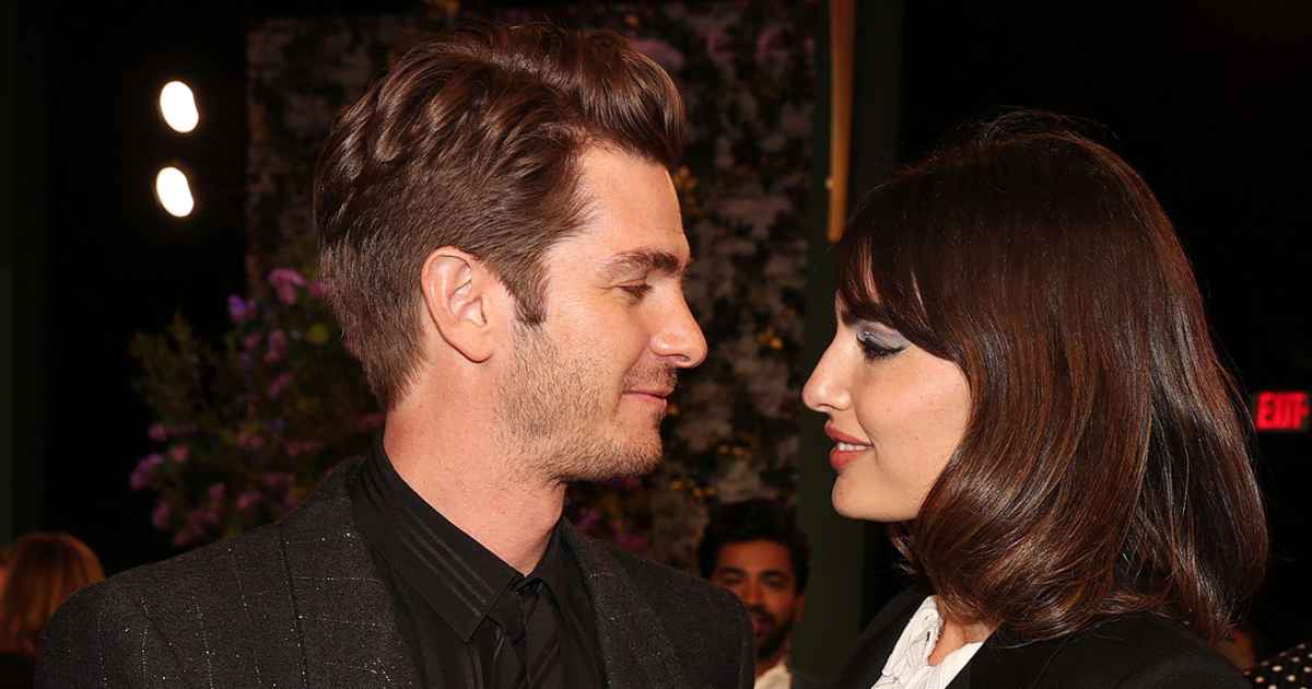 Emma Stone and Andrew Garfield enjoy rare PDA at premiere