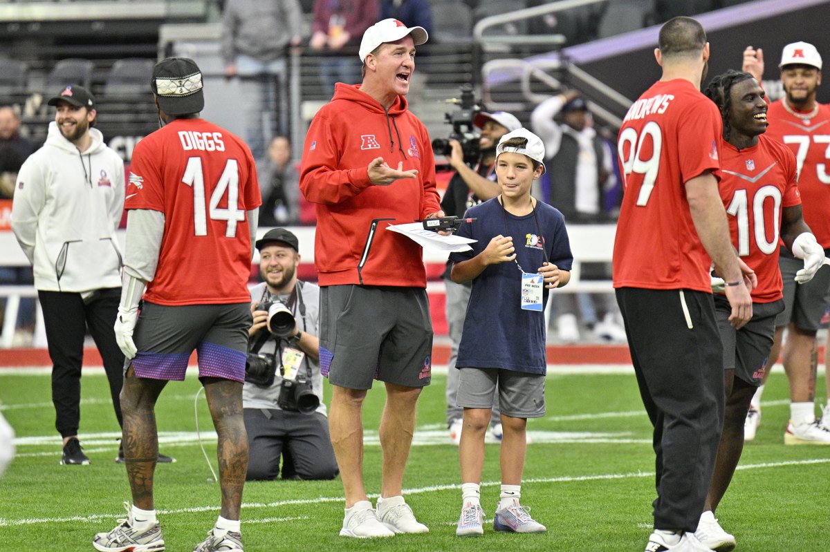 Eli Manning Poses with Kids in Rare Shoot, Shares Which Sport He Coaches